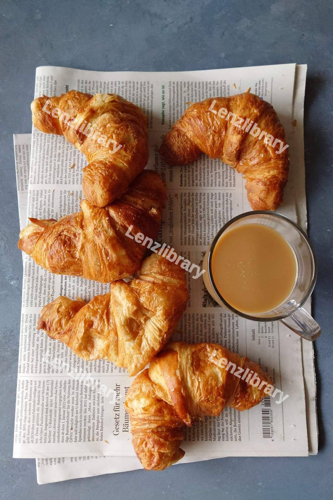 Croissants on a wooden chopping board